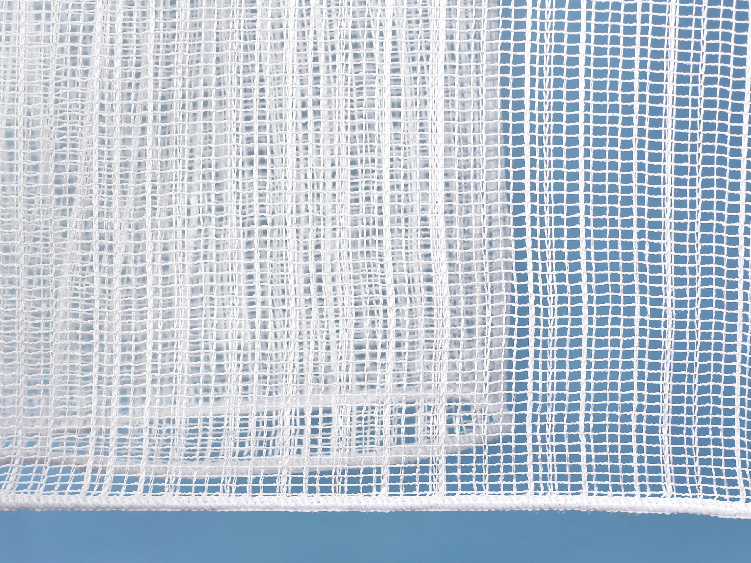 Žakárová záclona síť s olůvkem značky Škodák.