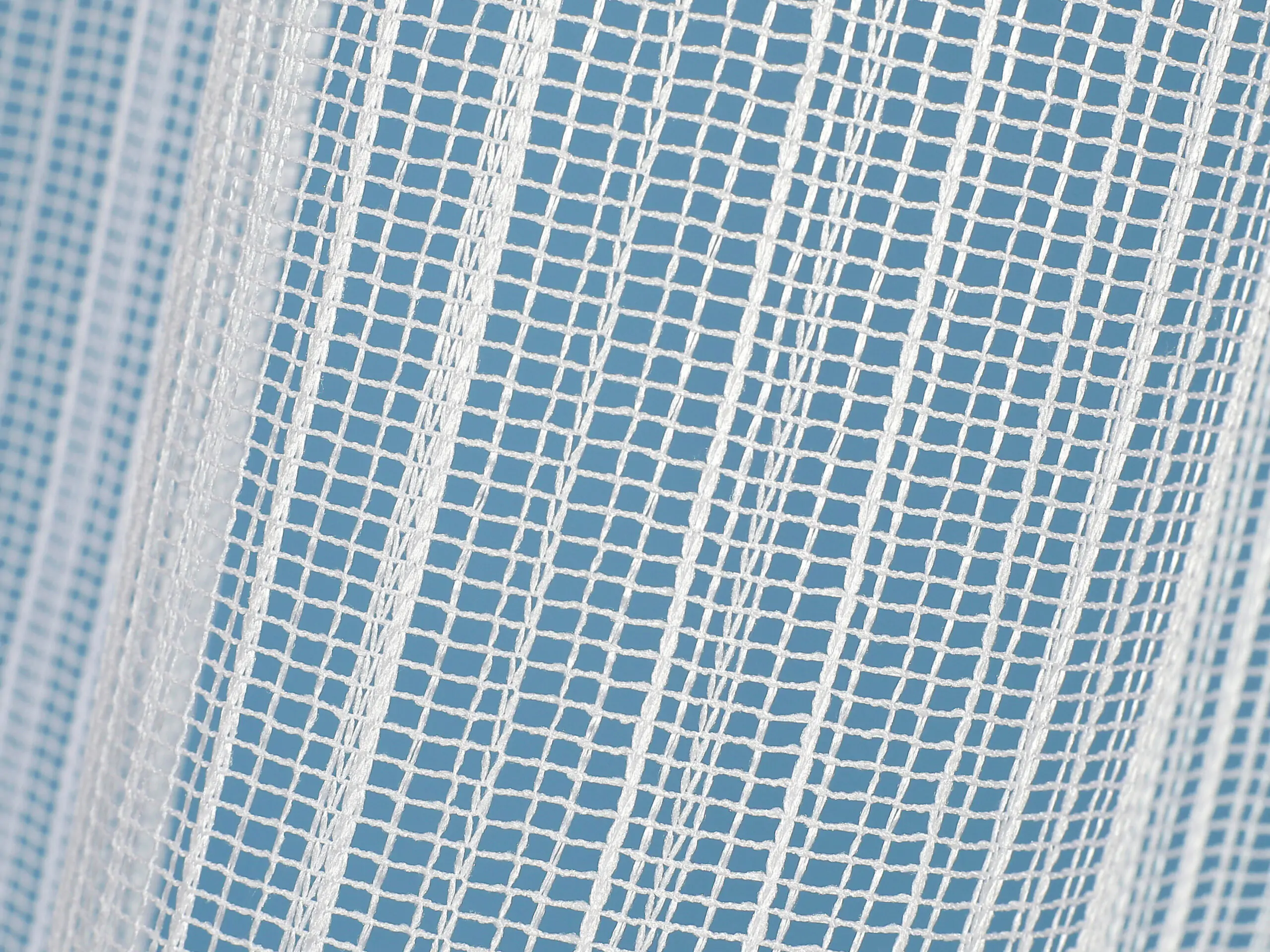 Žakárová záclona síť s olůvkem značky Škodák.