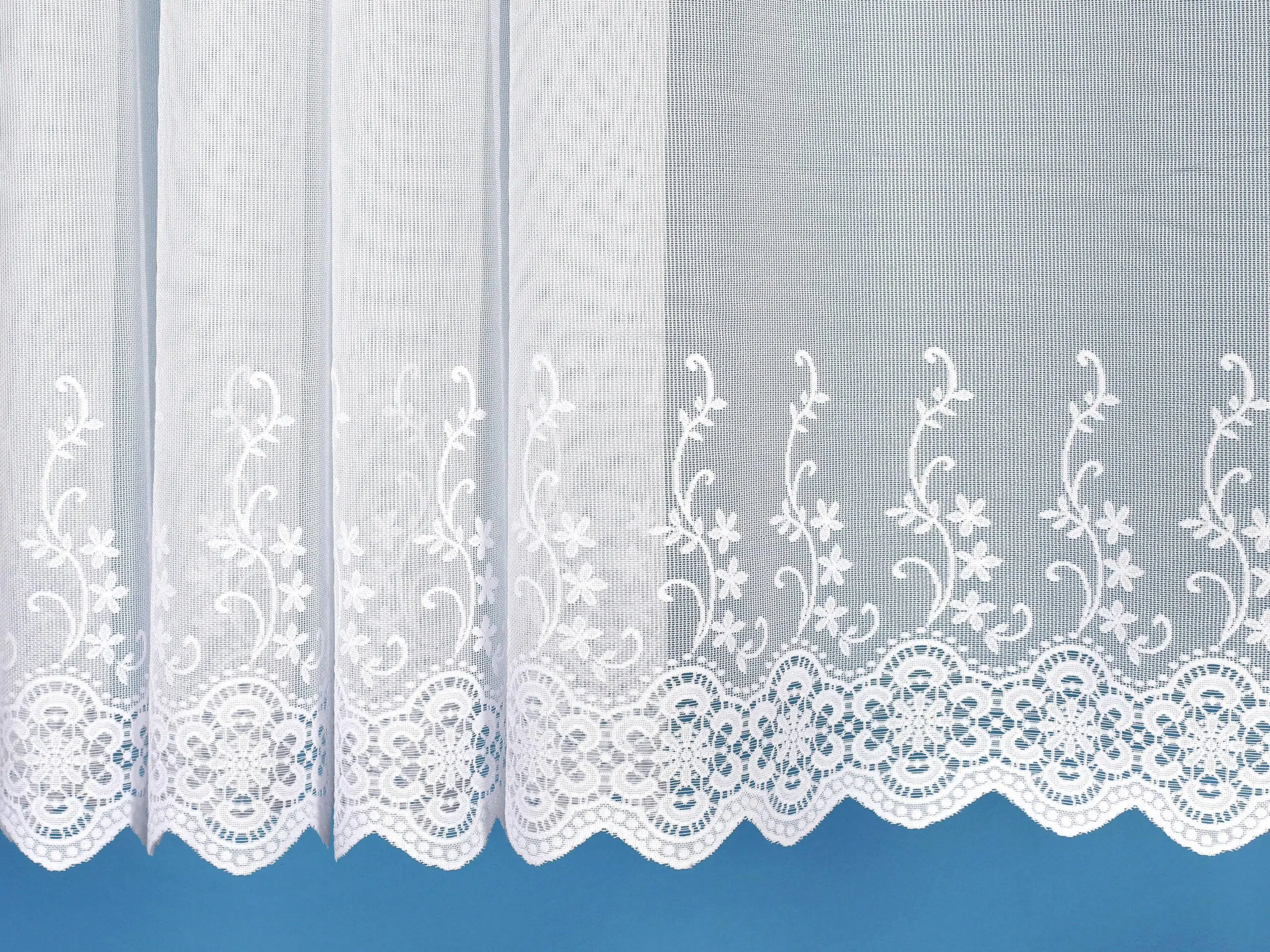 Žakárová záclona květy bez olůvka značky Škodák.