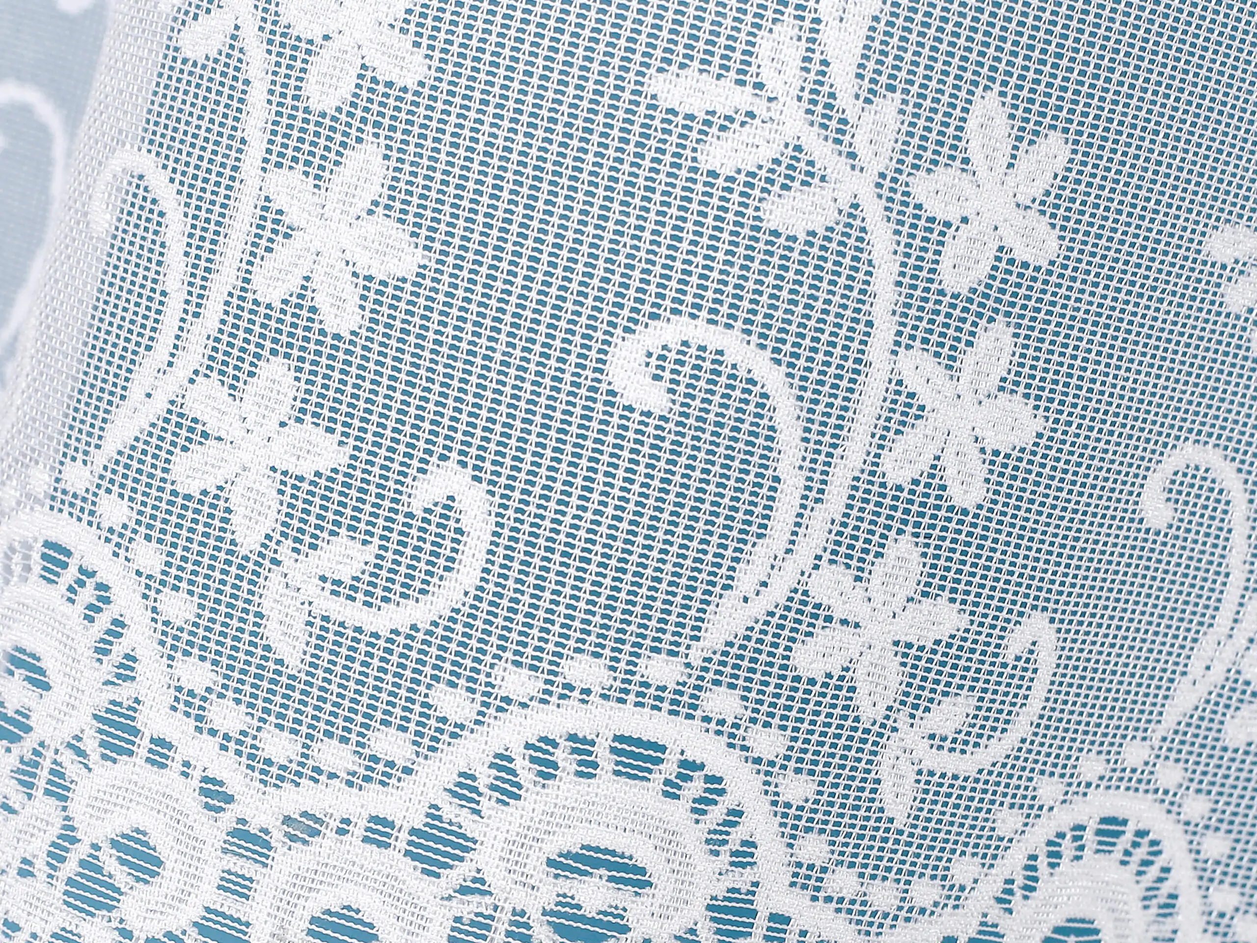 Žakárová záclona květy bez olůvka značky Škodák.