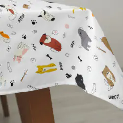 Hranatý bavlněný ubrus pejsci na bílé značky Škodák.