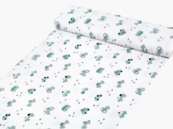 Bavlněná látka zelená autíčka na bílé metráž značky Škodák