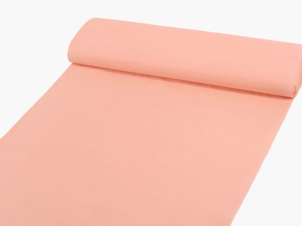 Bavlněná látka plátno SUZY lososová značky ŠKODÁK.