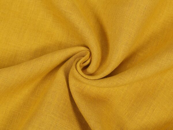 Lněná látka hořčicová - metráž značky Škodák