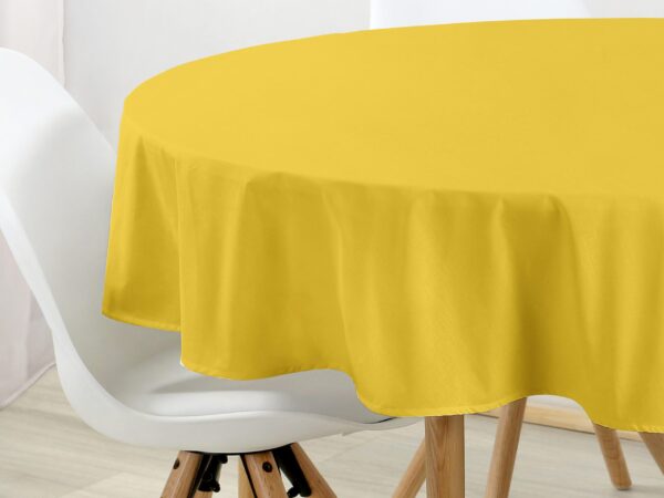 Bavlněný kulatý ubrus žlutý značky Škodák.