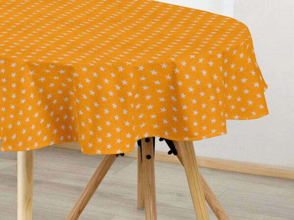 Oválný bavlněný ubrus bílé hvězdy na oranžové značky Škodák