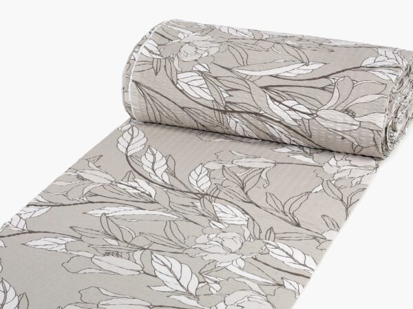 Krepová látka šedé květy na šedé metráž značky Škodák