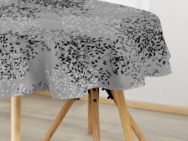 Oválný bavlněný ubrus drobné černé lístky značky Škodák