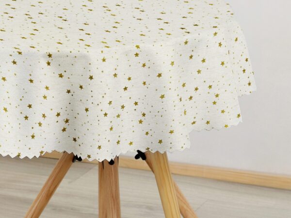 Kulatý dekorační ubrus zlaté hvězdy na režné značky Škodák.