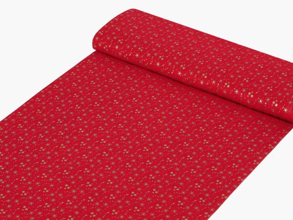 Bavlněná látka zlaté vločky na červené metráž šířka 142 cm značky Škodák.